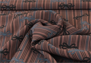 Плательная вискоза коричневая с бантиками м2459